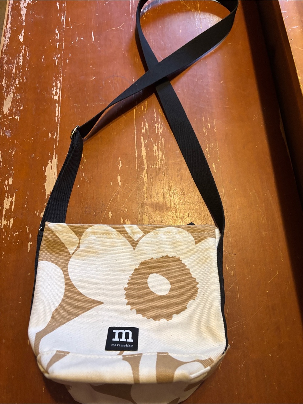 Marimekko Beige and Black Floral Crossbody Bag 9Hx8Wx5D One makeup spot inside.